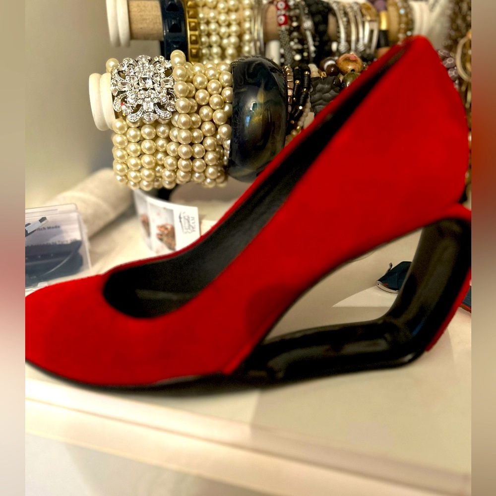 Red suede wedge heel. Really comfortable.